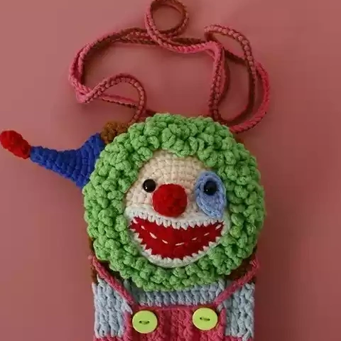 Hand-crocheted clown phone bag