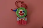 Hand-crocheted clown phone bag