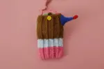 Hand-crocheted clown phone bag