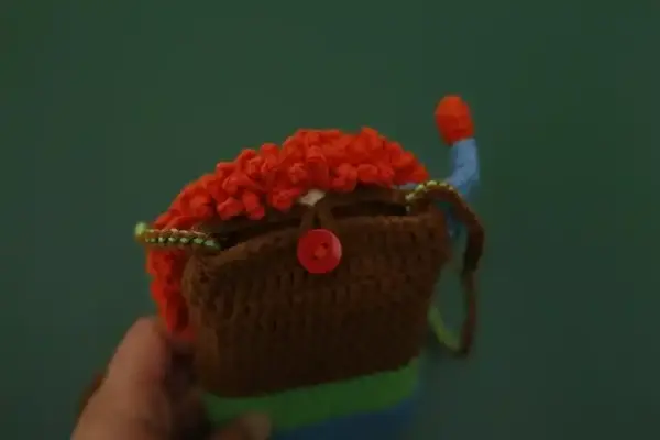 Hand-crocheted clown phone bag
